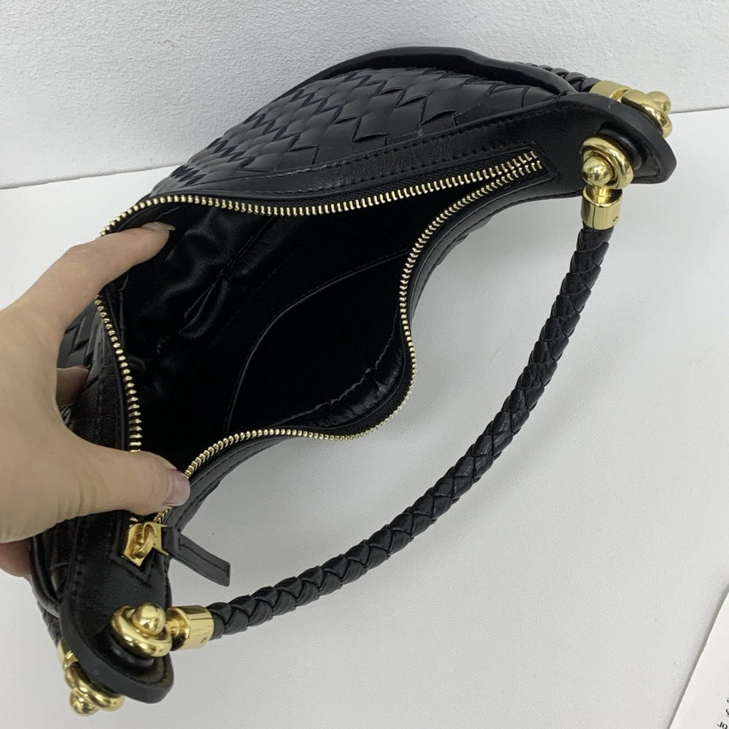 网红爆款编织纹真皮腋下包女百搭2025春季新款牛皮单肩斜跨饺子包