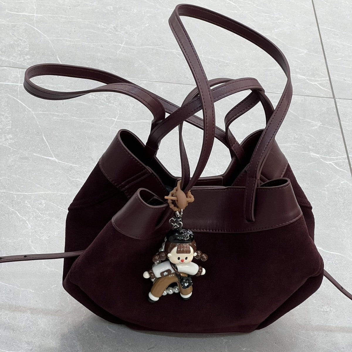 磨砂真皮菜篮子包水桶包包女高级感小众手提包麂皮绒斜挎包锦囊包