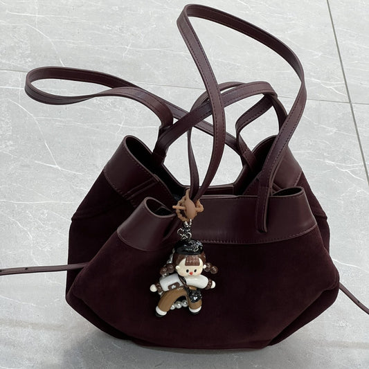 磨砂真皮菜篮子包水桶包包女高级感小众手提包麂皮绒斜挎包锦囊包