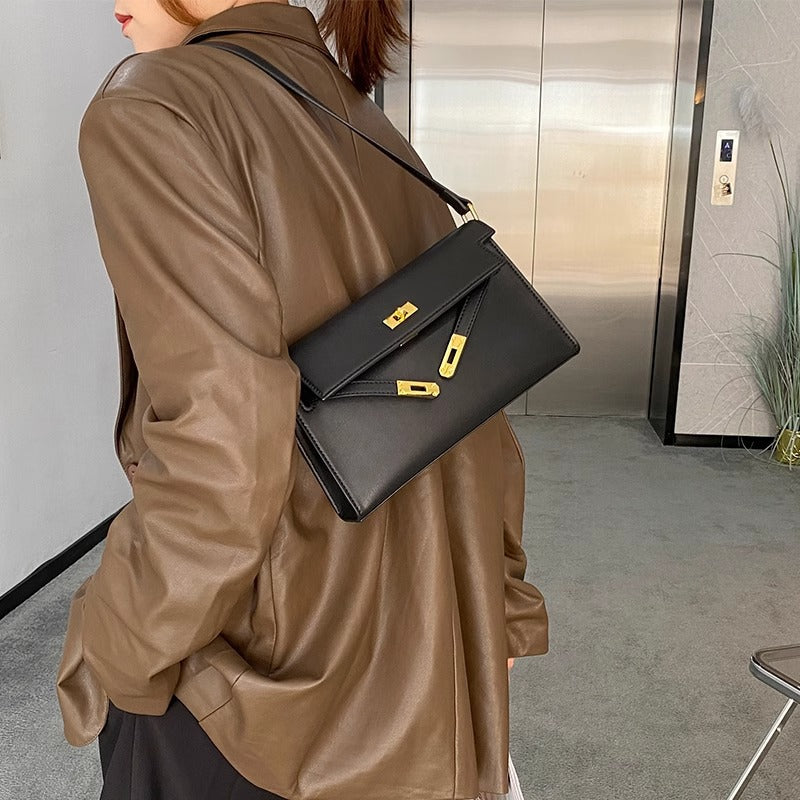 腋下包包女春夏2024新款通勤法棍包斜挎包高级质感复古单肩凯莉包