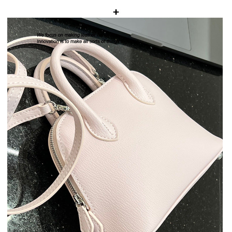 头层牛皮纯皮经典百搭时尚迷你手提小包贝壳包真皮单肩斜挎手机包