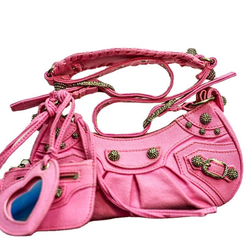 真皮包包女2022新款单肩轻奢月牙包质感法式腋下铆钉流苏褶斜挎