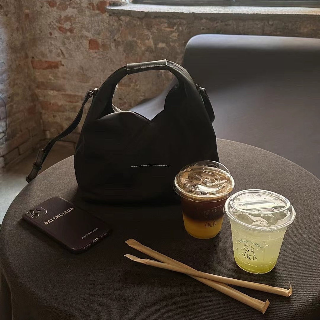 防水牛津布帆布水桶包女高级感小众手提饭盒包真皮斜挎包小托特包