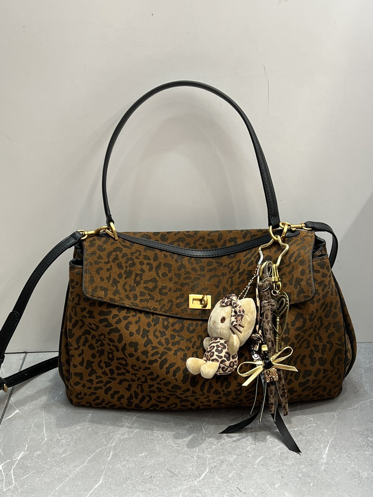 2024秋冬新款时尚通勤马毛羽毛包豹纹腋下单肩包百搭手提斜挎包女